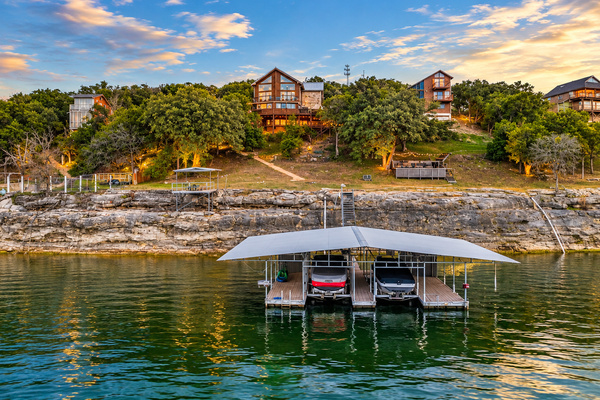 Lake Travis waterfront with direct lake access for swimming, fishing, and relaxing by the water. Boat lifts not for guest use. Guest may temporarily tie up to load and unload 