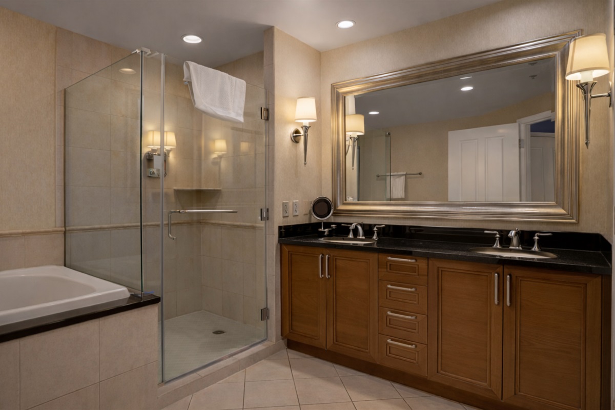 Elegant bathroom with spacious walk-in shower and premium amenities.