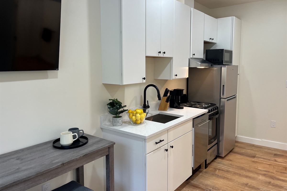 Full kitchen with dishwasher