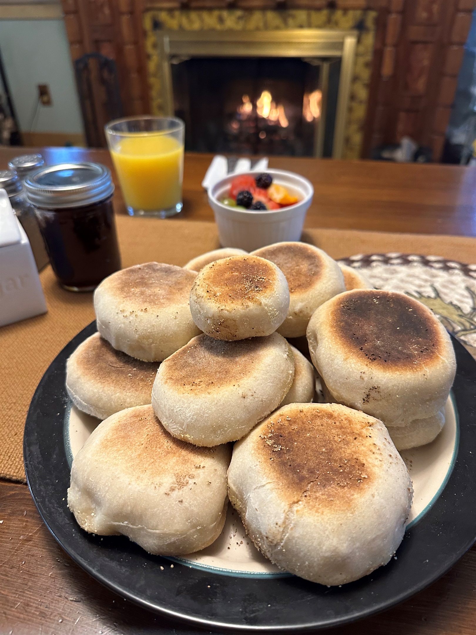 Made from scratch sourdough English Muffins piping hot and ready for homemade preserves