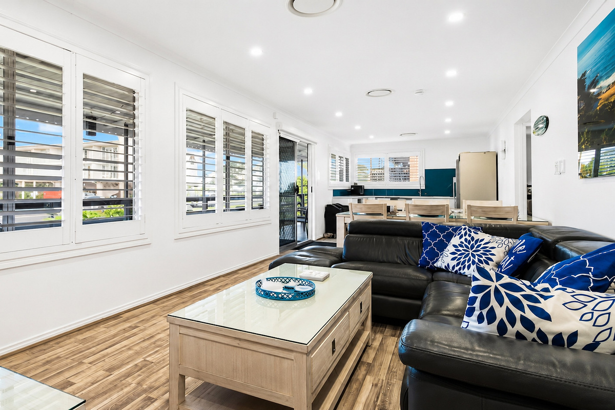 Skye’s Beach House Malua Bay features an upstairs living, dining and kitchen area, with water views from the kitchen windows.