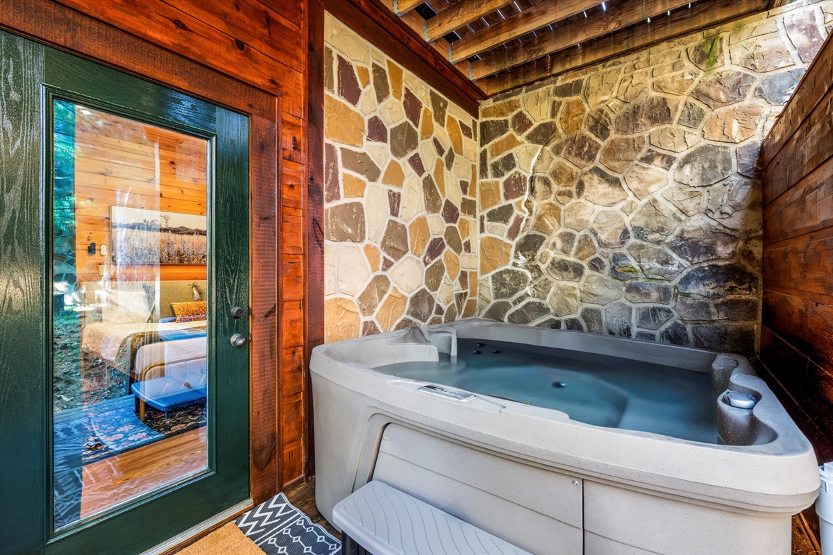 There's a second hot tub on the lower deck near Bedroom 6