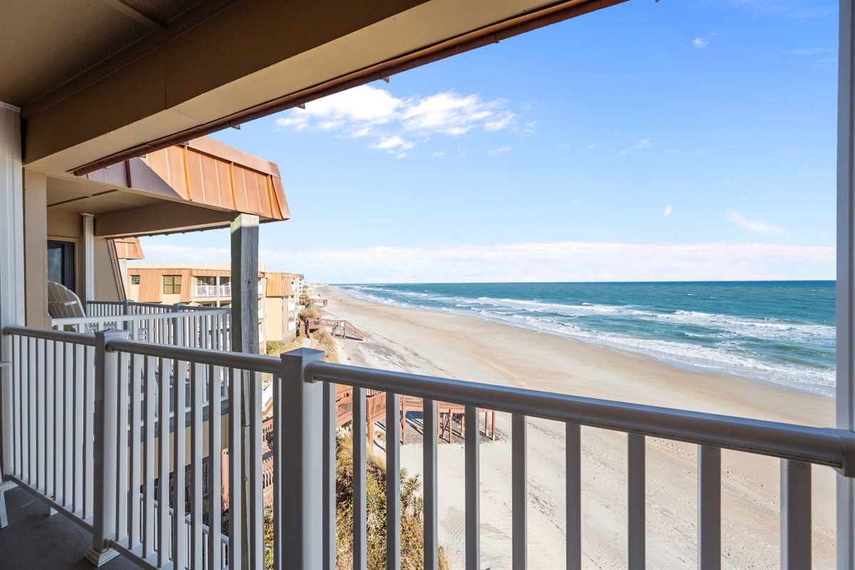 Welcome to Sunrise Suite: wake up to endless ocean views and the soothing sound of waves from your private balcony!