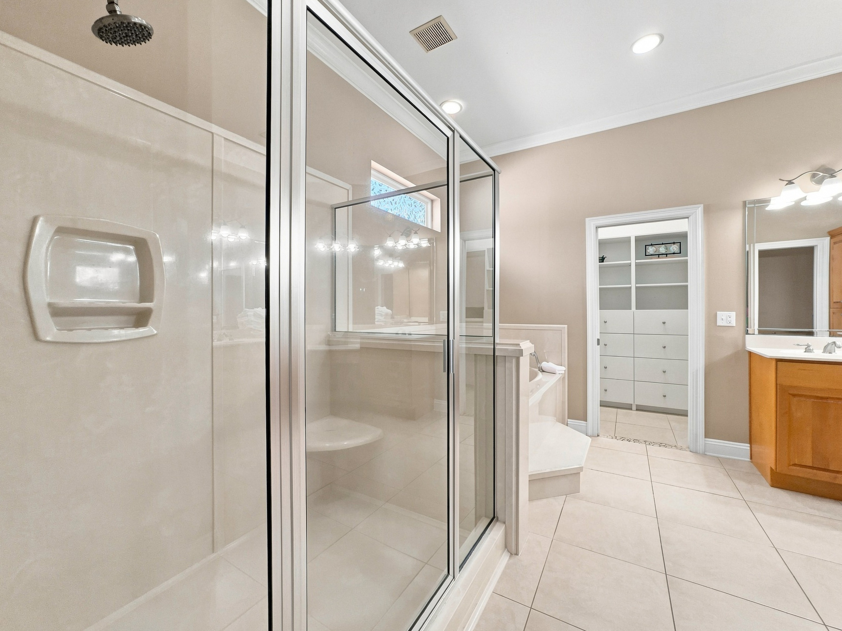 Bathroom with a spacious walk-in glass shower
