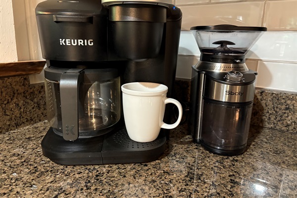 Wake up to fresh, easy coffee with a Keurig, full-pot brewer, and burr grinder all ready on the counter for the perfect morning brew.