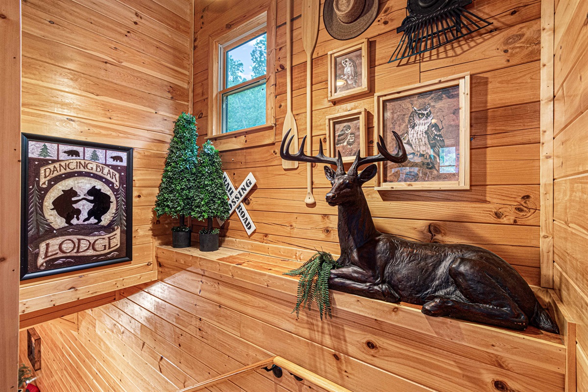 Mountain Lodge Style: This unique sitting area features rustic décor and a majestic deer.