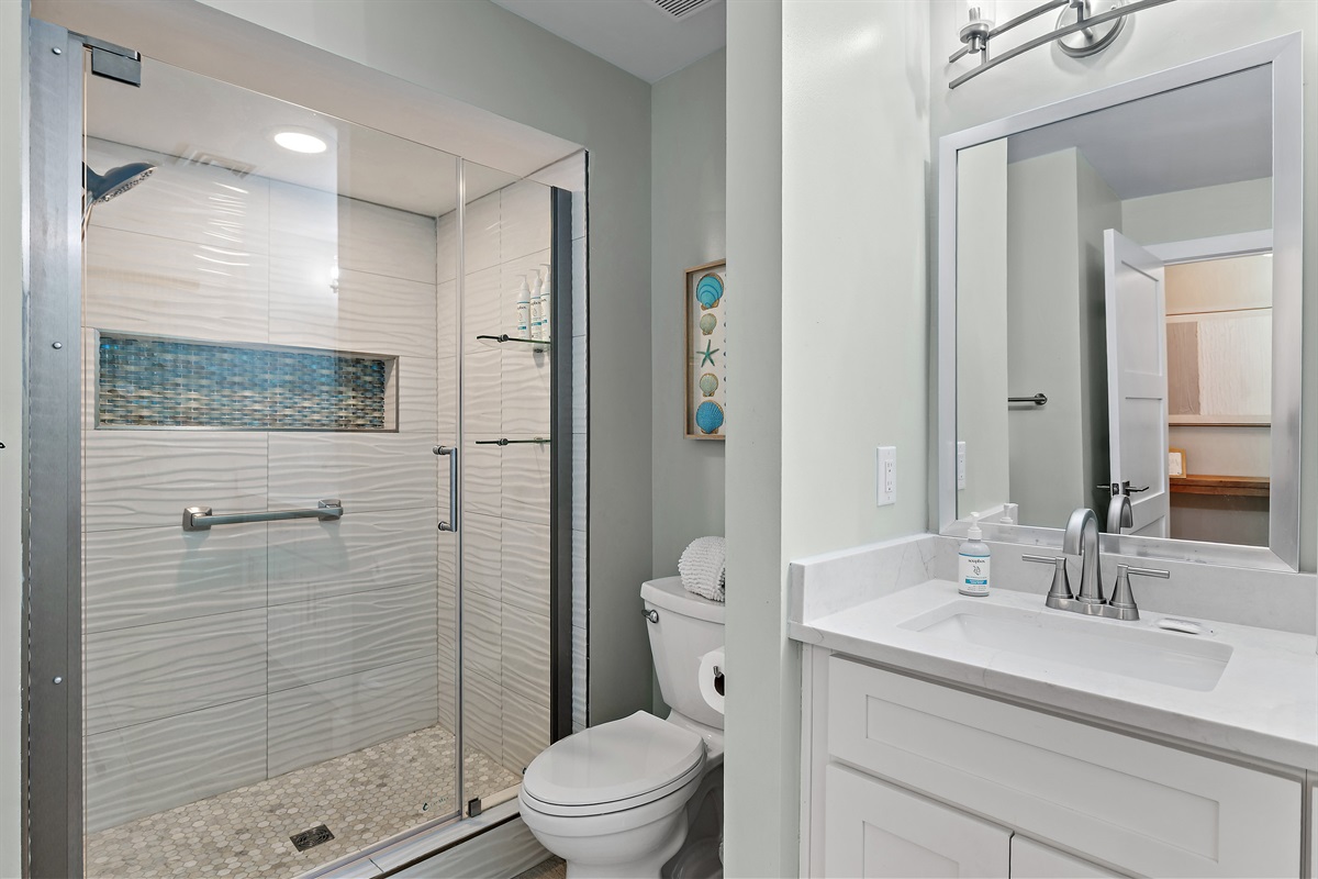 Remodeled Bathroom with Dual Vanity and Walk in Shower