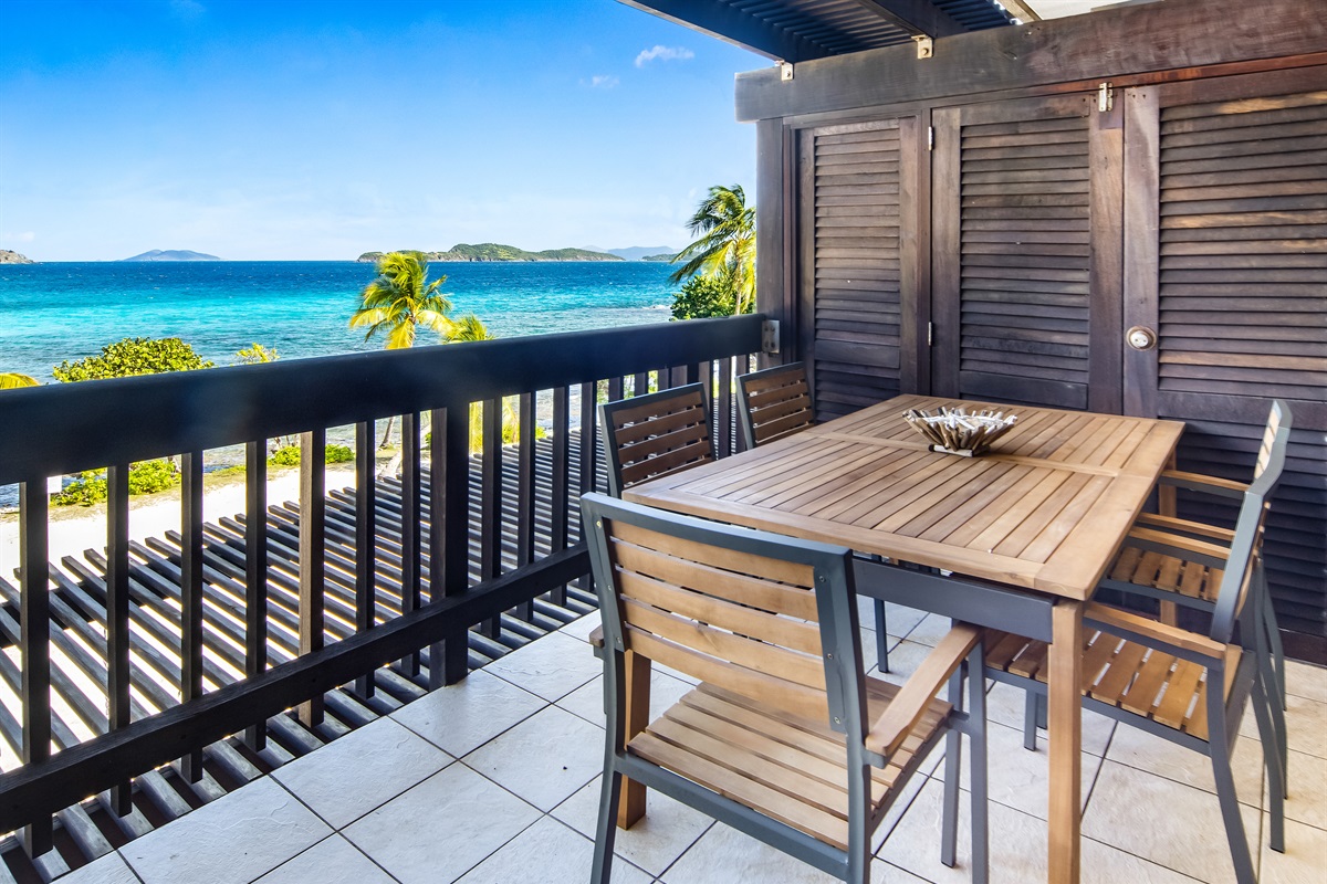 Enjoy morning coffee or evening drinks from your private balcony seating area overlooking the Caribbean.
