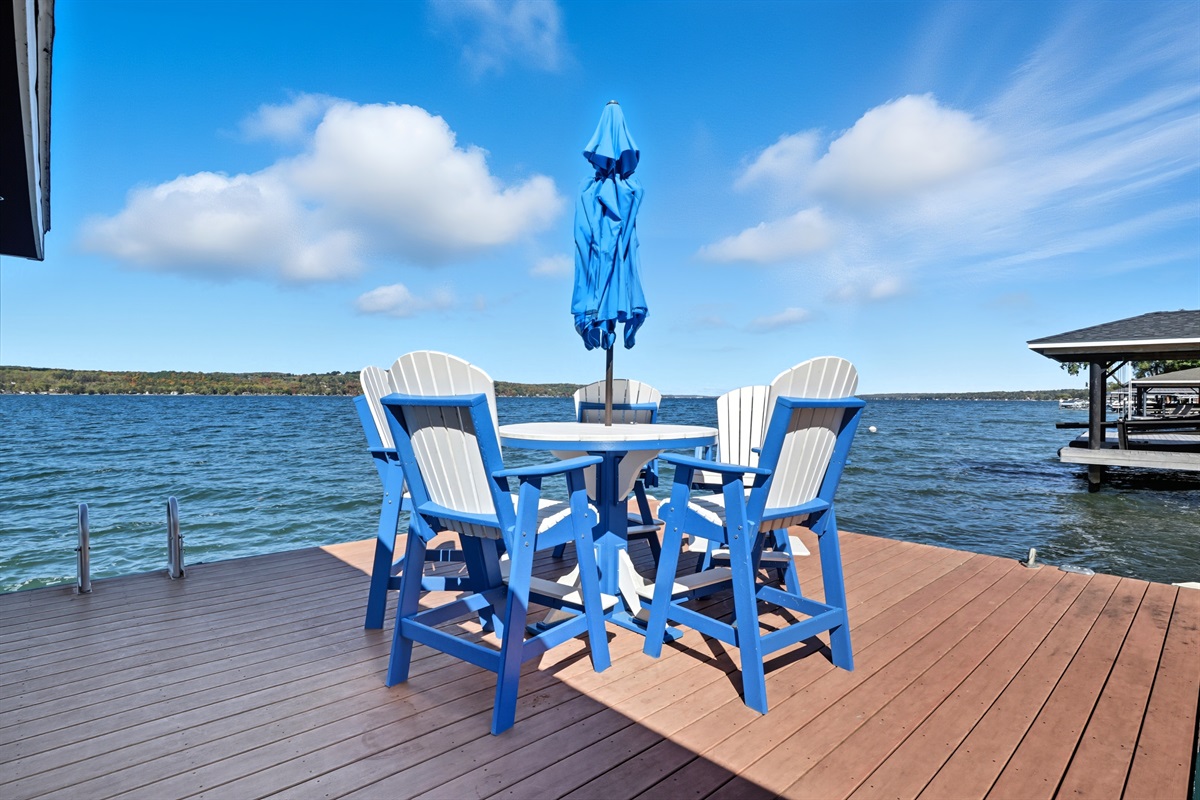 Lakeside dining on the dock with waterfront views.