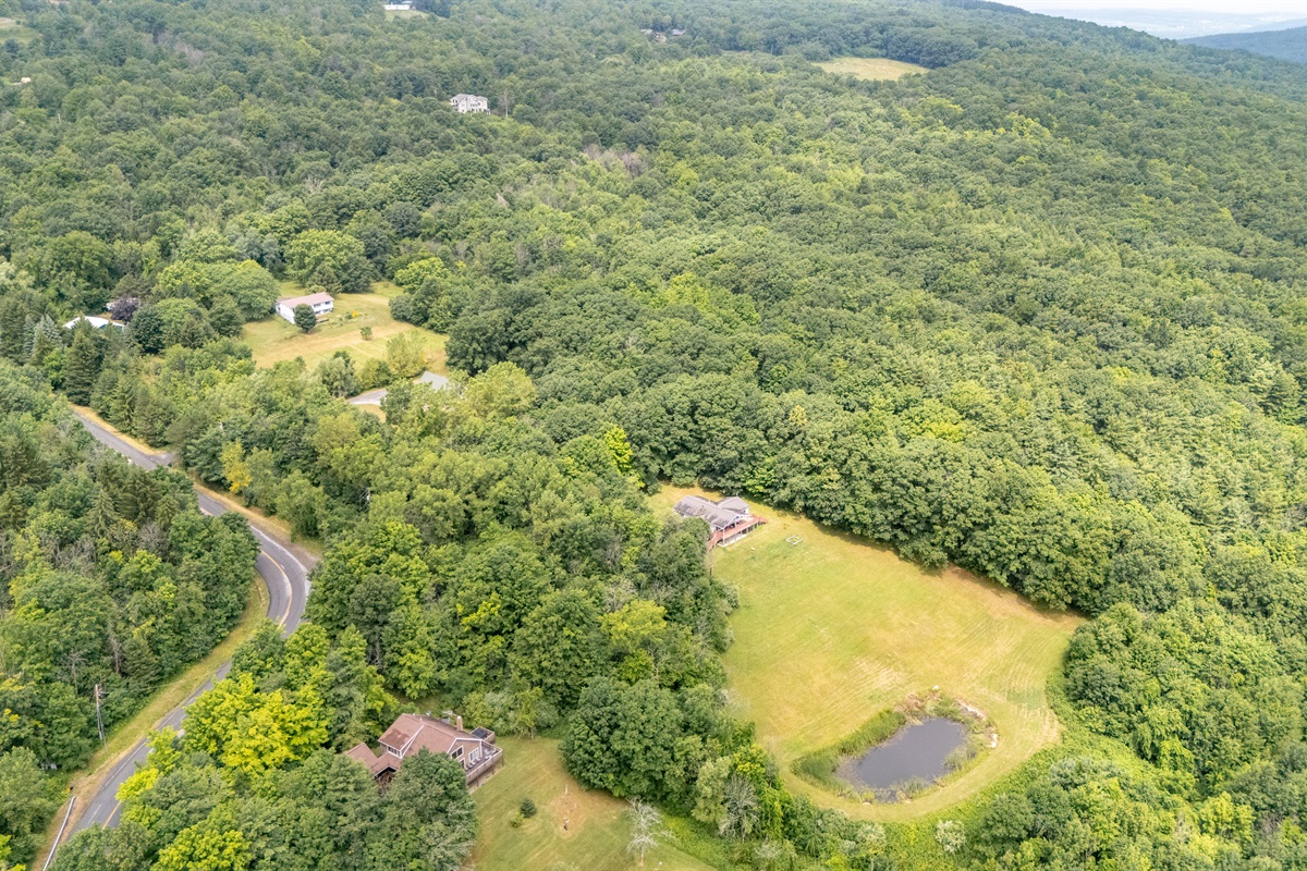 Tucked into the rolling hills, this hidden gem offers unbeatable privacy while still being part of a quiet, scenic neighborhood