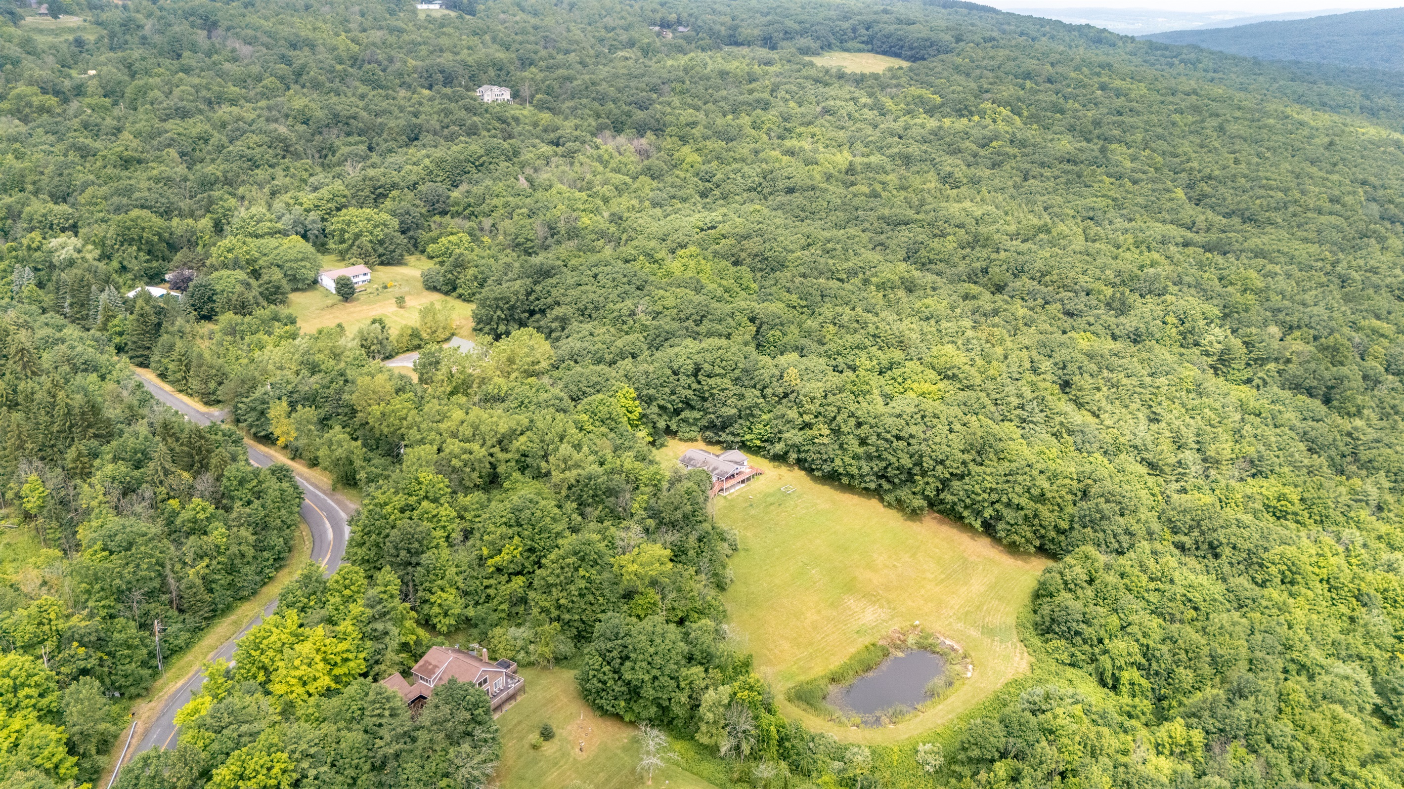 Tucked into the rolling hills, this hidden gem offers unbeatable privacy while still being part of a quiet, scenic neighborhood