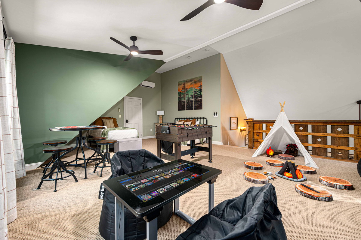The ultimate family loft with games, lounge space, and fun for every age.