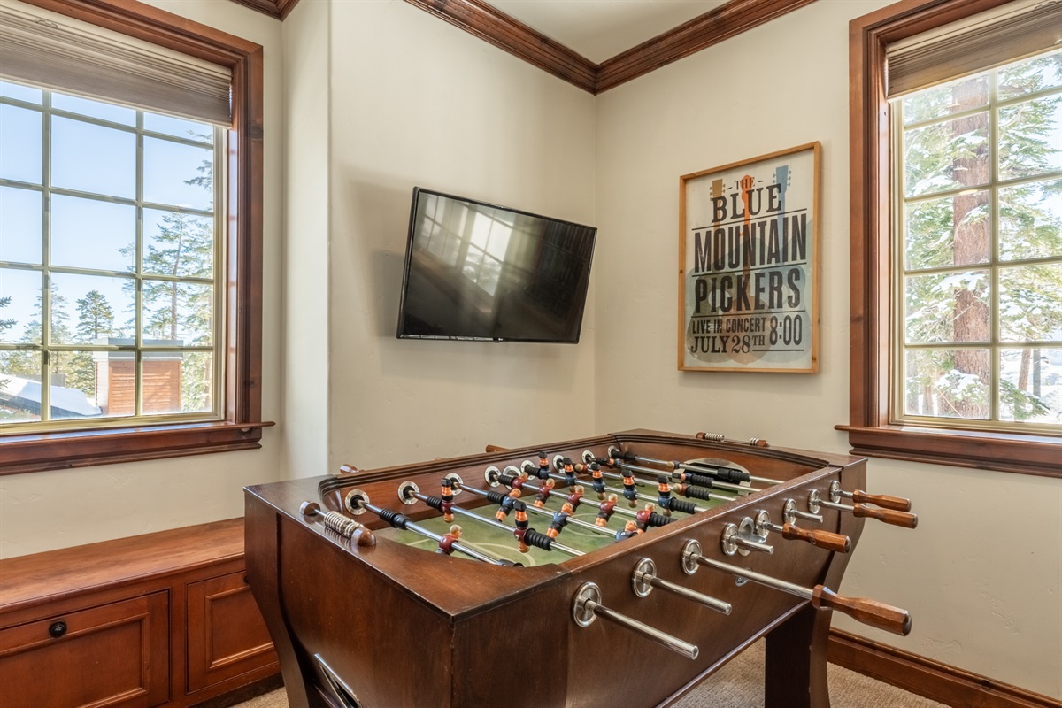 The Moost Bunkroom offers a foosball table, TV, and a cozy window seat make this bunkroom a favorite hangout space, day or night.