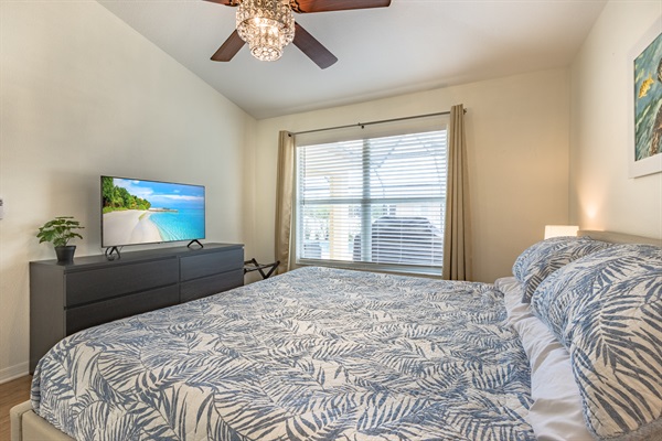 Master bedroom with king bed and Smart TV.