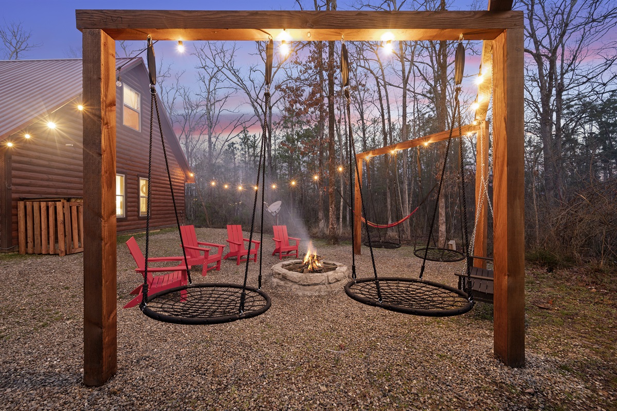 Find your bliss as you swing by the fire pit in our backyard - where warmth and relaxation come together for the perfect evening retreat