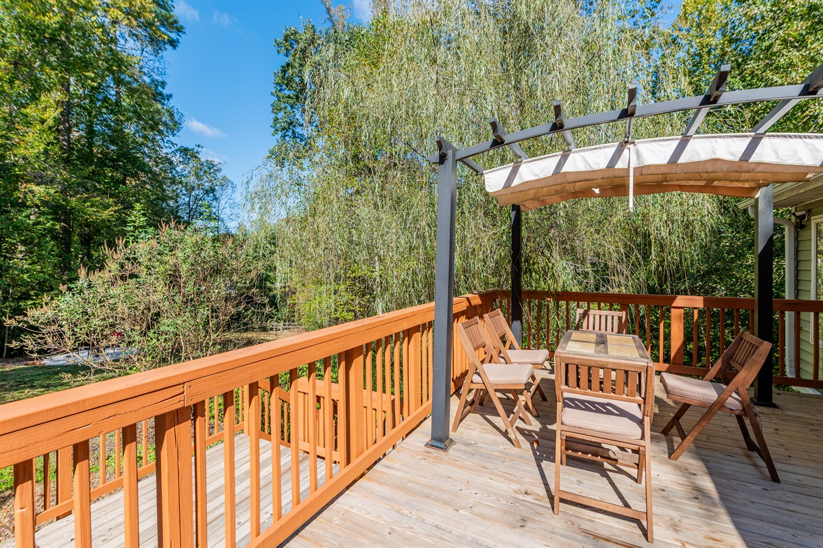 Deck: Enjoy outdoor meals surrounded by nature’s beauty on the spacious deck!