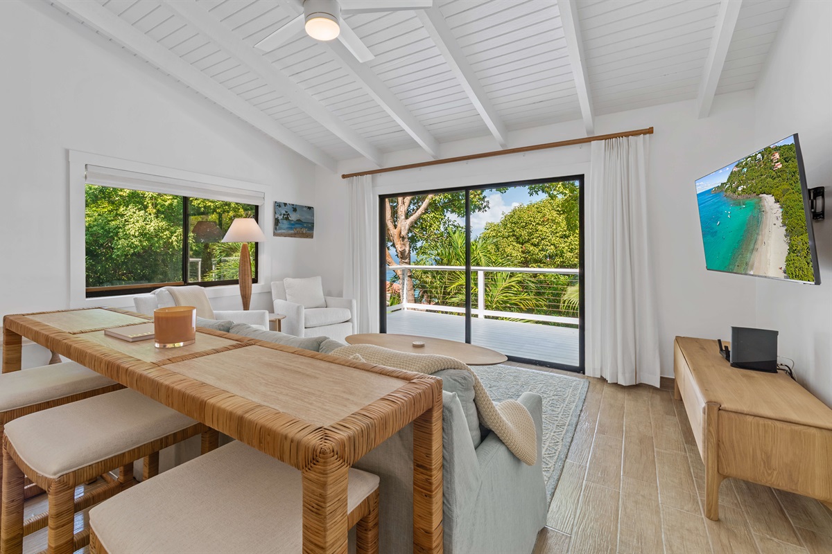 Sliding glass door takes you right out to the balcony for some fresh air. Please note the sliders are scheduled for replacement in off-season of 2026. They are currently a little heavy to slide open but definitely manageable. 