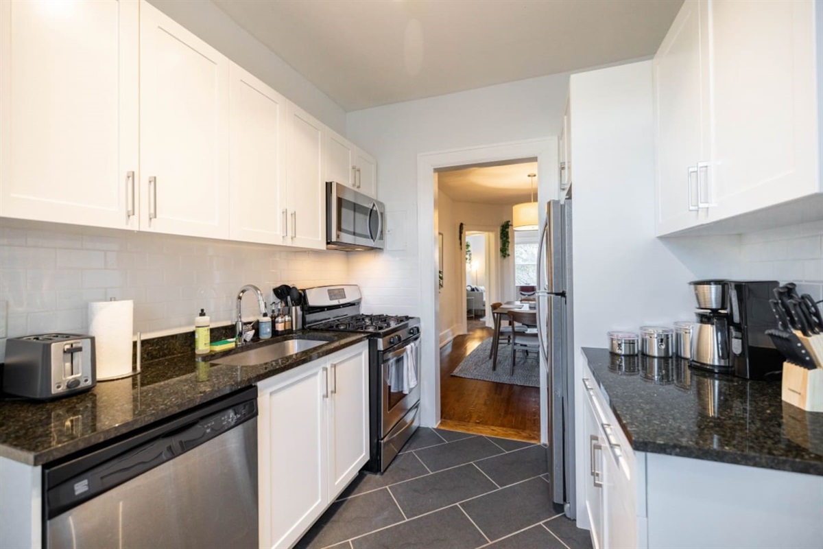 Kitchen with a full set of cooking equipments