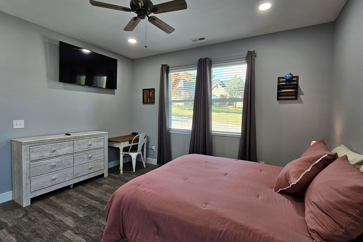 Perfect Queen suite for couples or additional guests with private workspace.