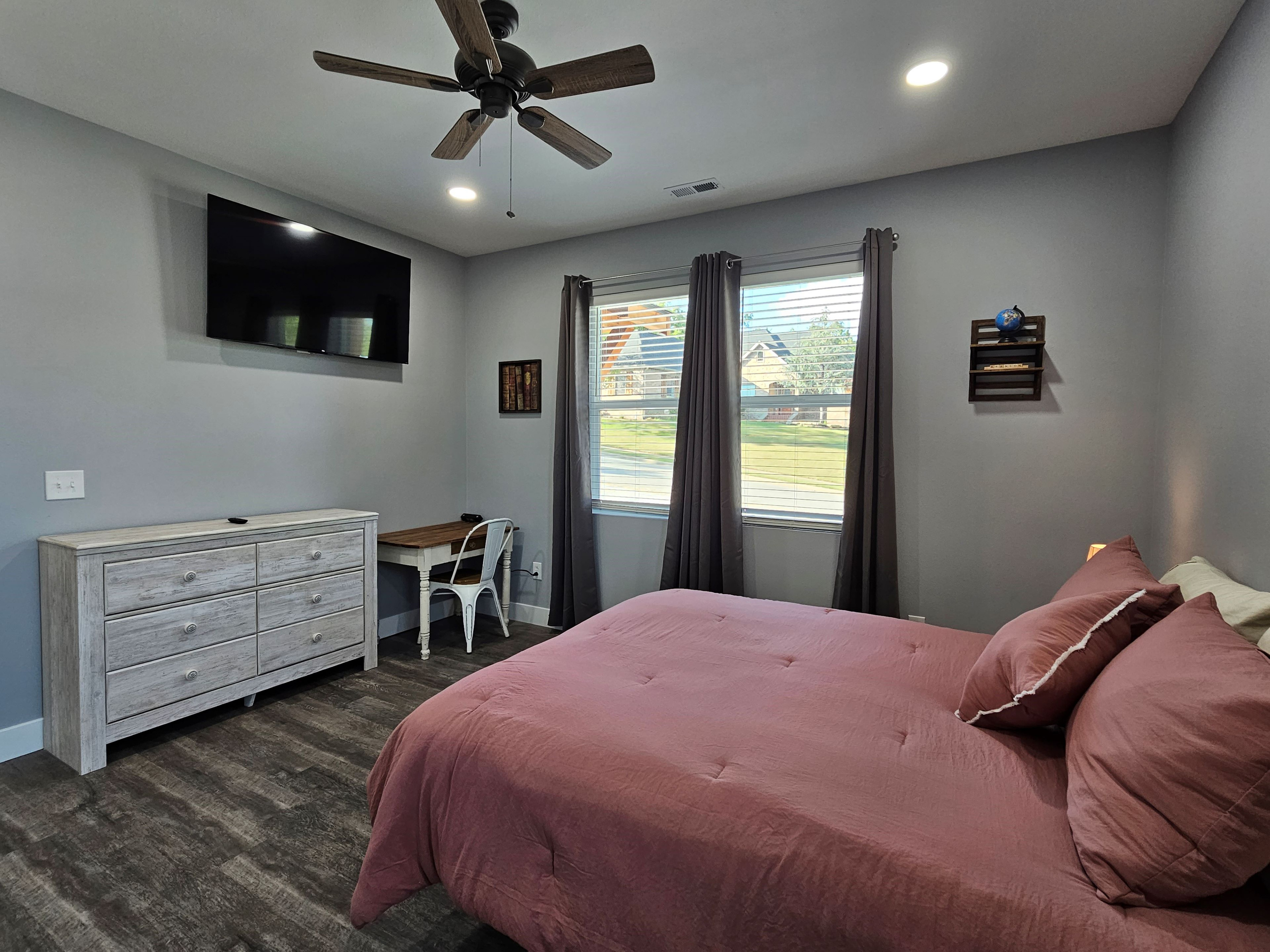 Perfect Queen suite for couples or additional guests with private workspace.