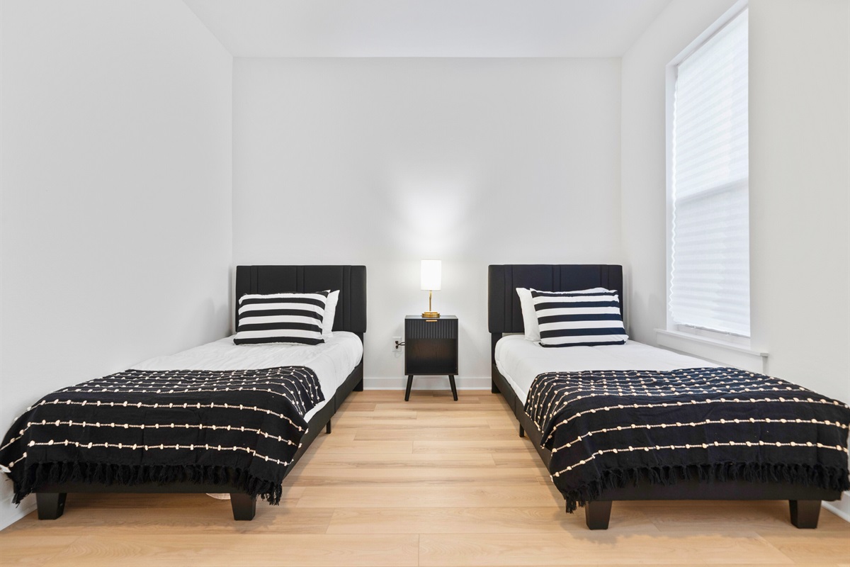 Multiple beds make this space ideal for shared stays without feeling cramped.