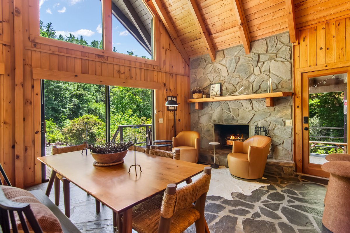 Dining room area and sitting area in front of the wood burning fireplace 