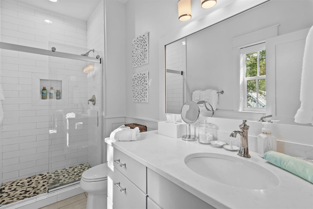 Queen bedroom bathroom with shower, large vanity