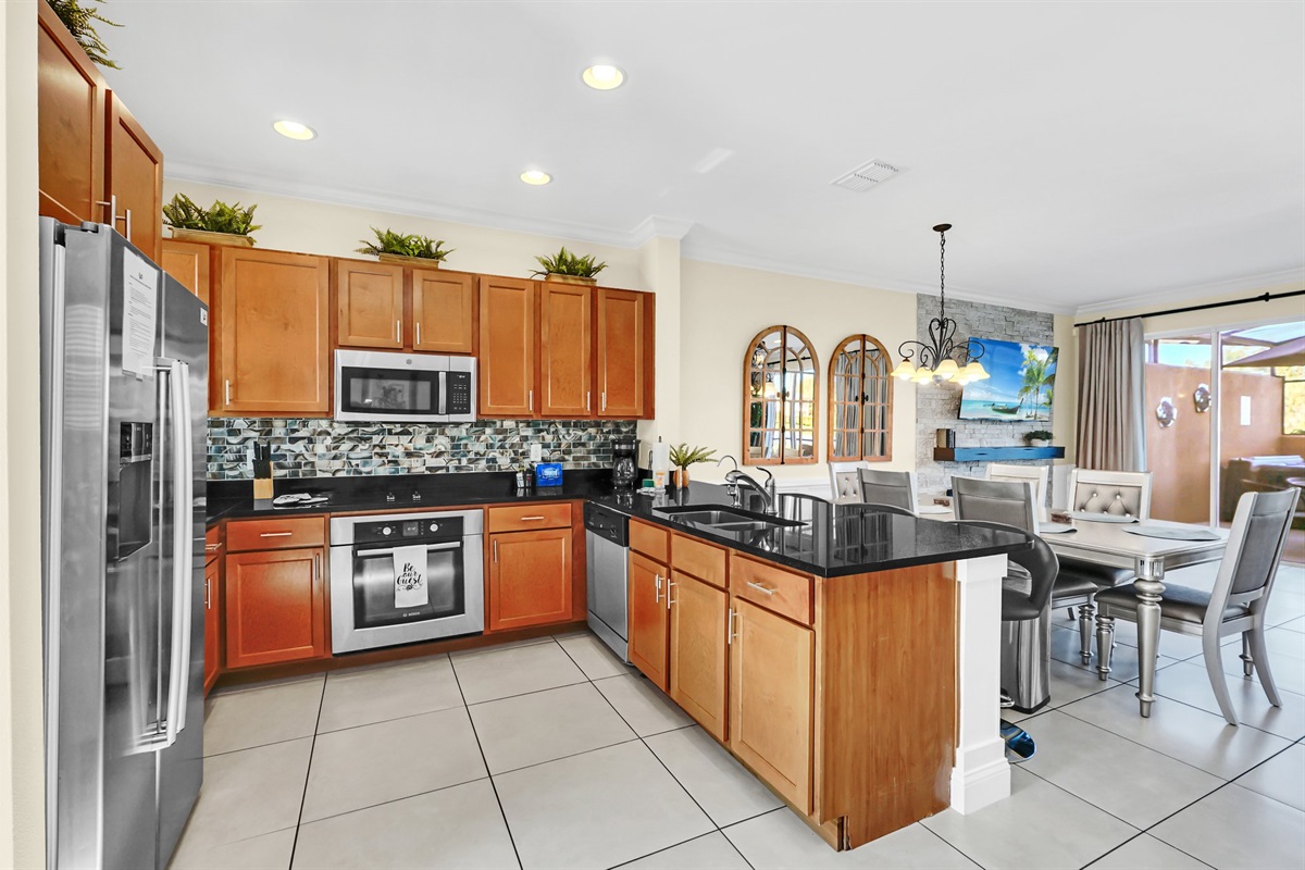 Large kitchen overlooks the living/dining room