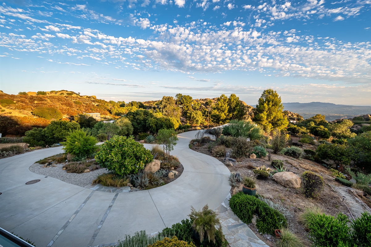 Unobstructed valley views in a magnificent backdrop of giant boulders and native, drought tolerant landscaping.