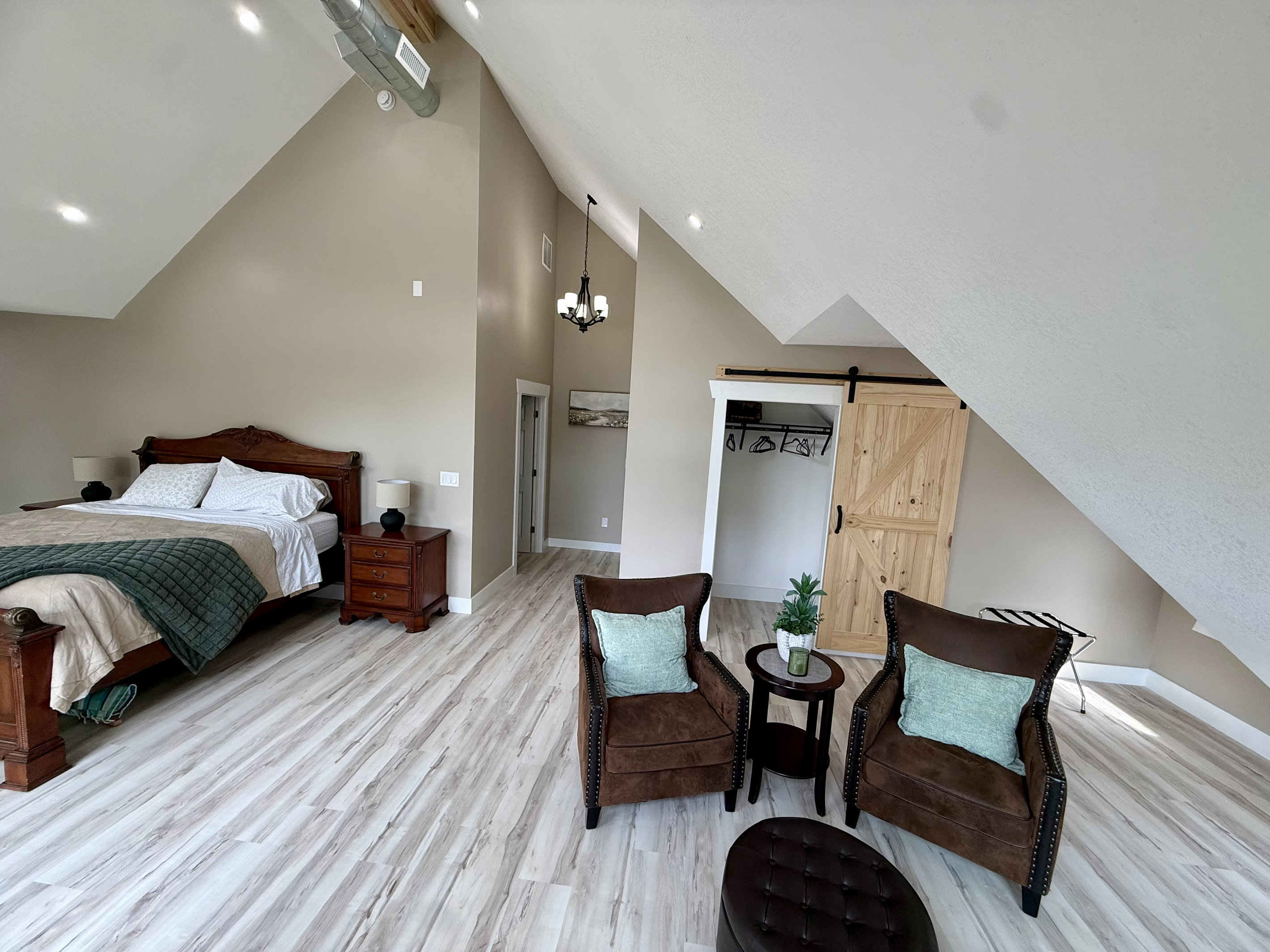 Master bedroom suite with seating area