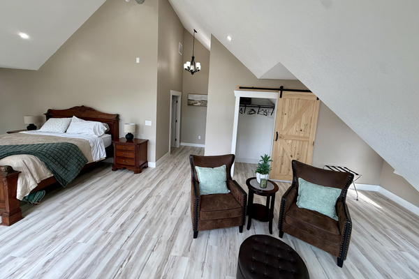 Master bedroom suite with seating area