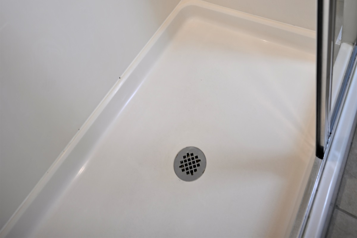 Large walk-in shower with seat