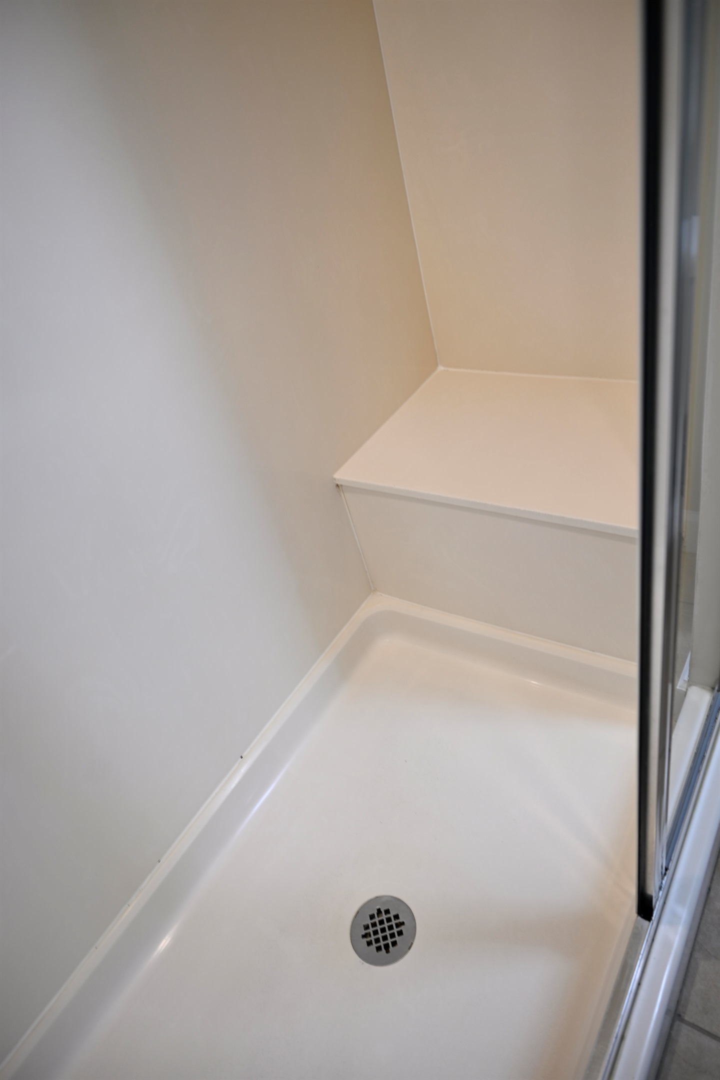 Large walk-in shower with seat