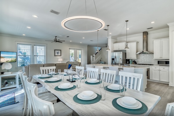 Dining Room table featuring 10 seats (4 additional stools at kitchen Island)
