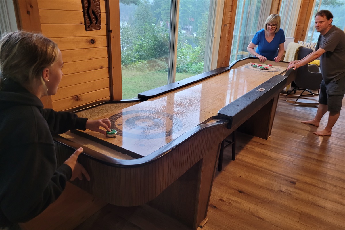 Shuffleboard provides indoor fun for young and old