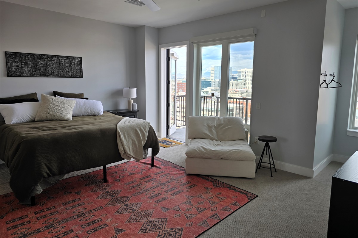 King size bed, extra seating area, private balcony with seating.