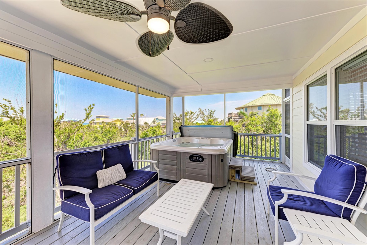 Main Level Patio - Hot Tub, Seating Area, and Dining Table