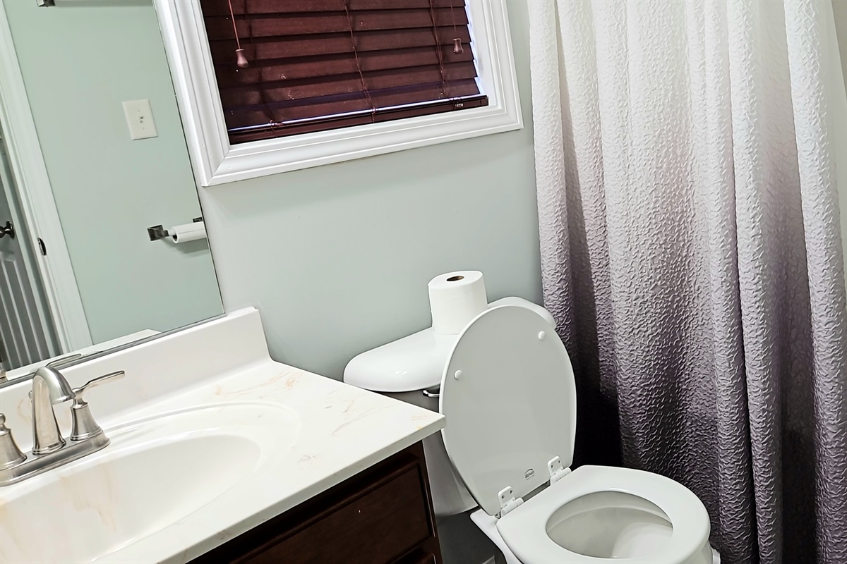 Separate full master bath downstairs