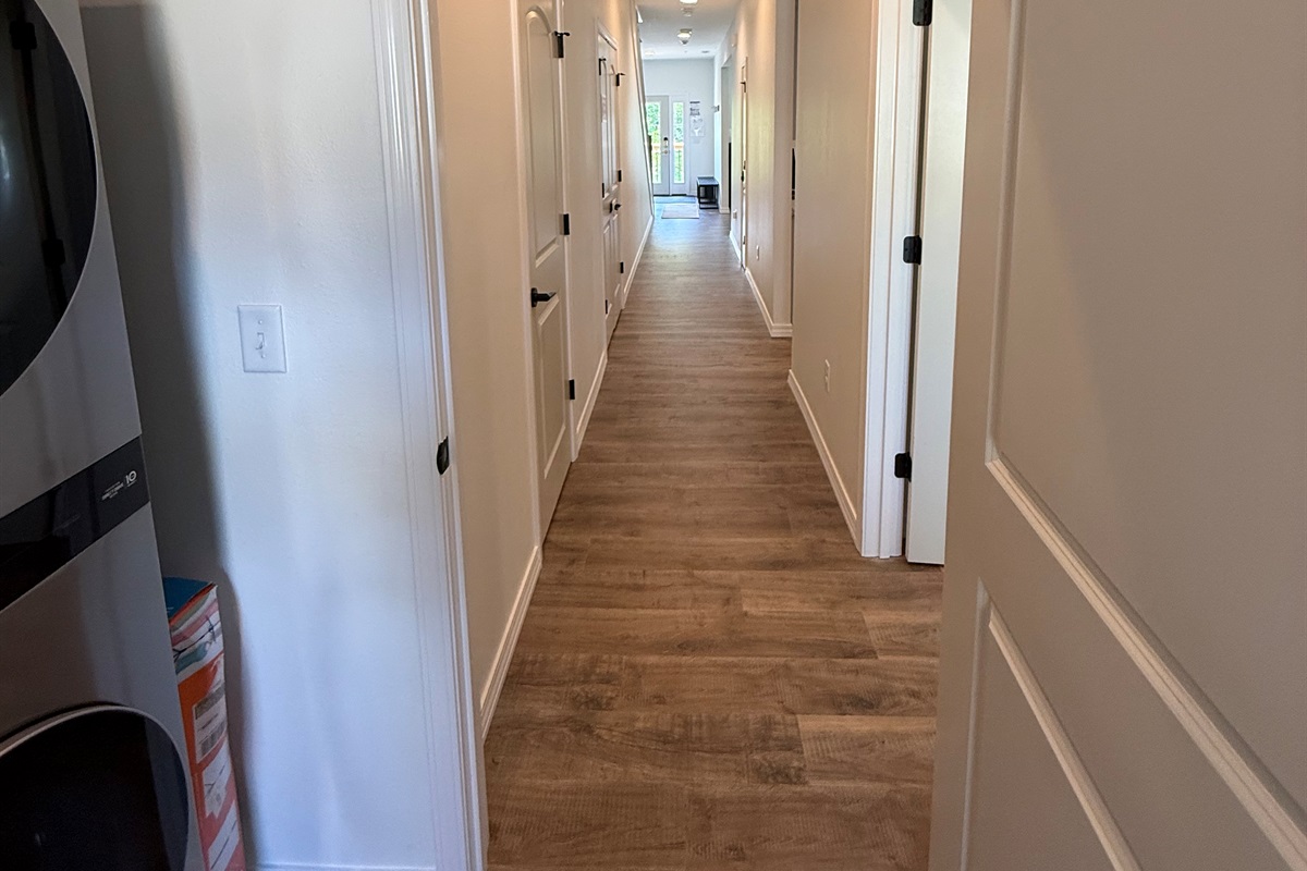 Beautiful long hallway on first floor. 