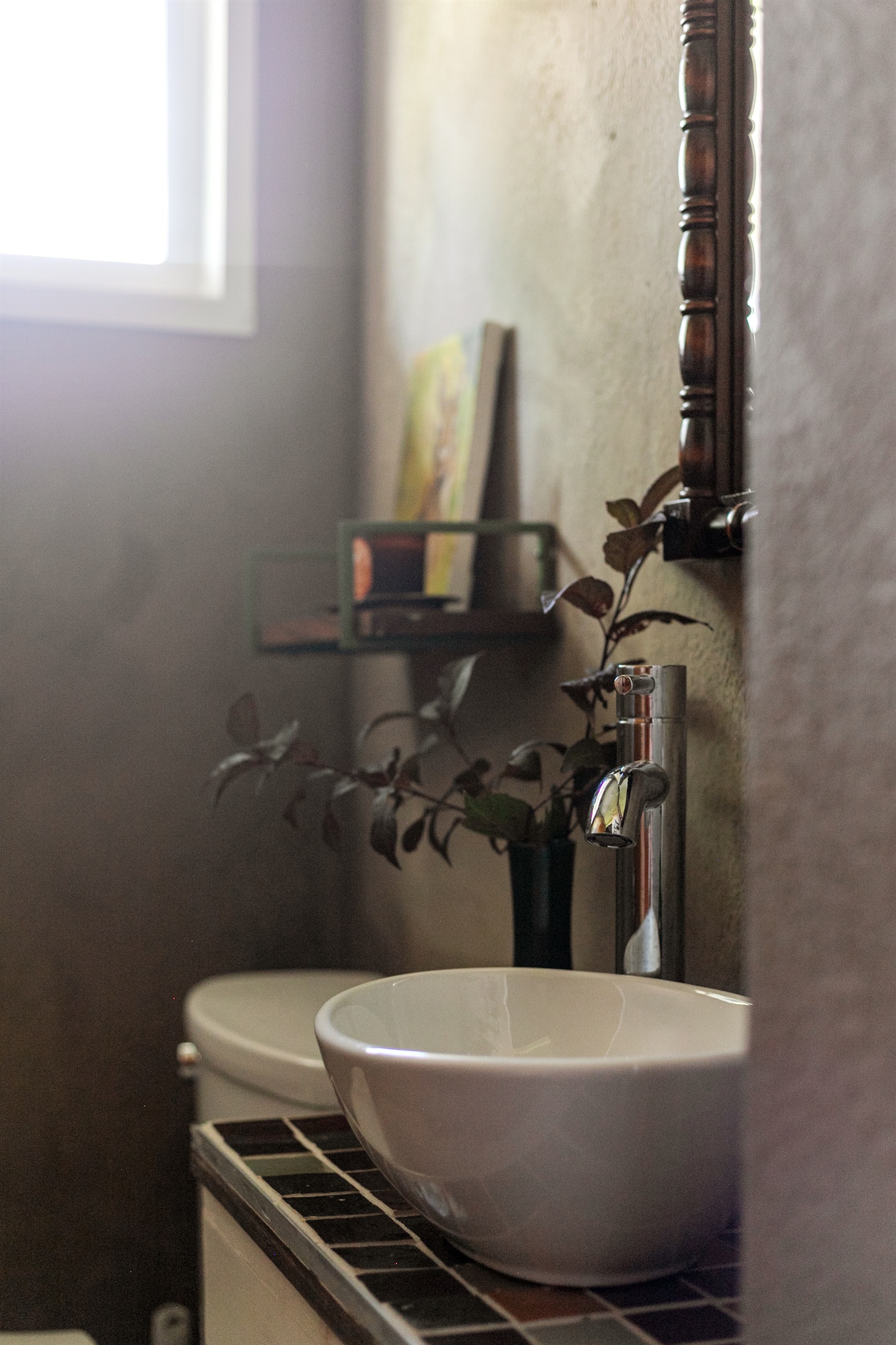 The main level includes a convenient half bath, making it easy for guests to freshen up without needing to head upstairs.