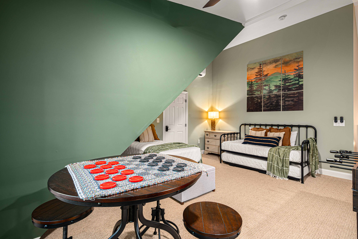 Battle it out in a game of checkers at the high top table.