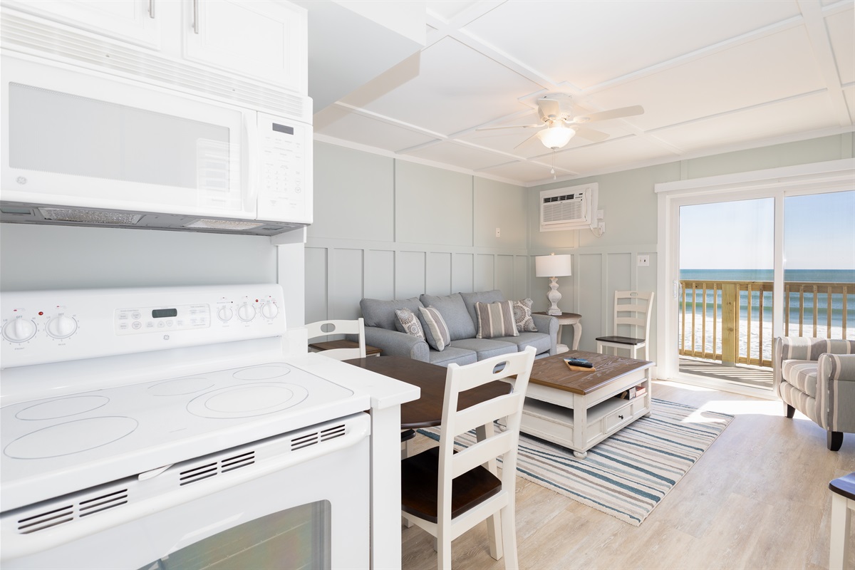Views of the ocean beyond the living room from kitchen