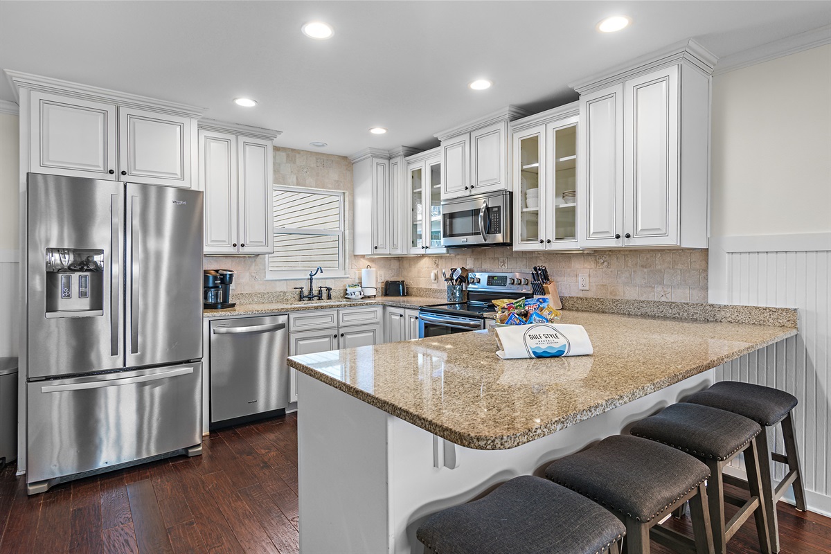 Remodeled, Fully-Stocked Kitchen with Granite Countertops and Stainless Appliances