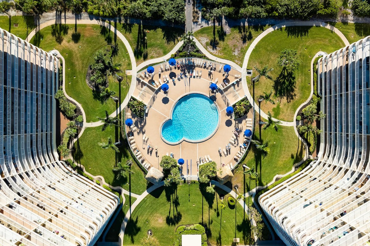 Aerial Elegance: Majestic Airbnb Property with Serene Pool, Captured from Above