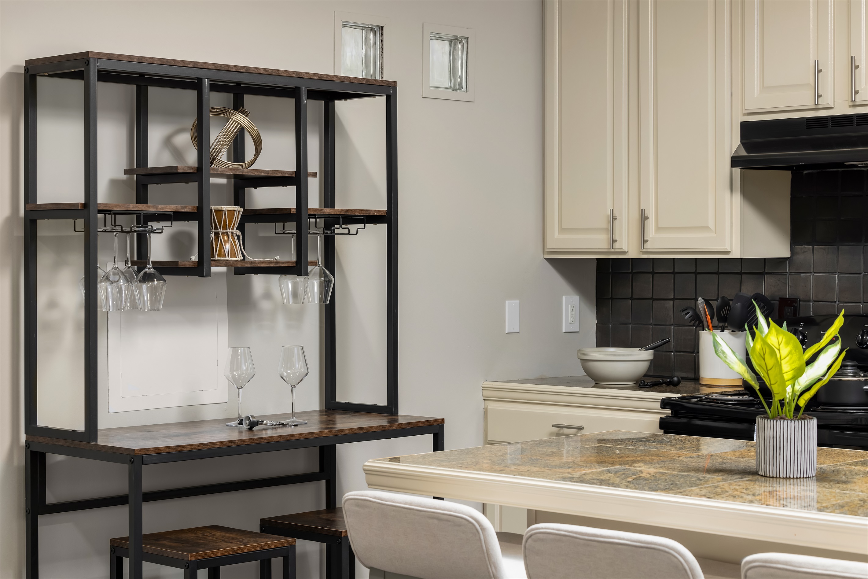 Chic and inviting, our kitchenette doubles as a sophisticated wine bar, where you can unwind with your favorite vintages, complemented by shatterproof glassware. Reach out to us for our person