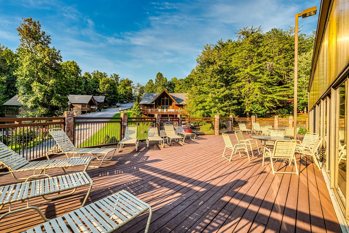 Soak up the sun on the outdoor deck by the indoor resort pool