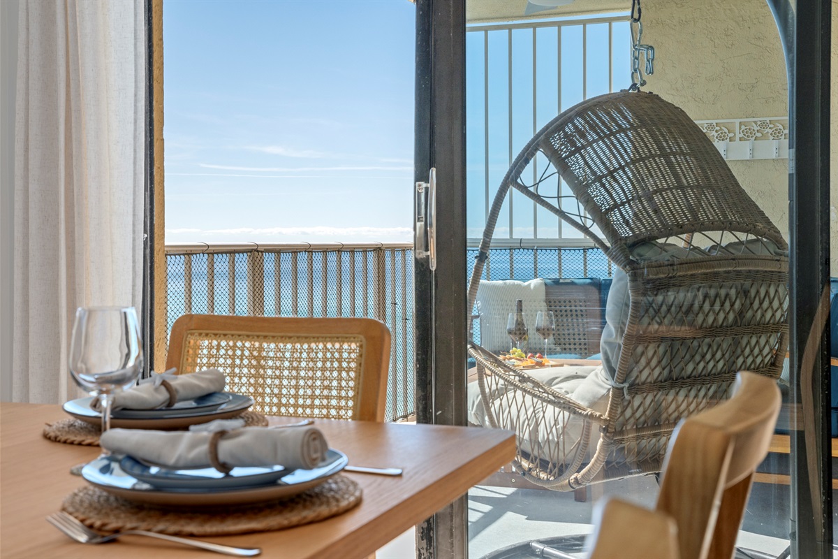 Dine with stunning ocean views, then step out to your breezy balcony swing for the ultimate coastal unwind.