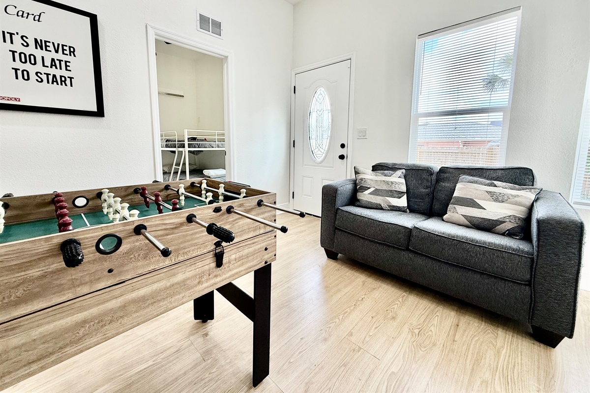 Whether you're challenging friends to a foosball match or tackling a load of laundry, this dual-purpose room keeps your vacation running smoothly—and playfully.