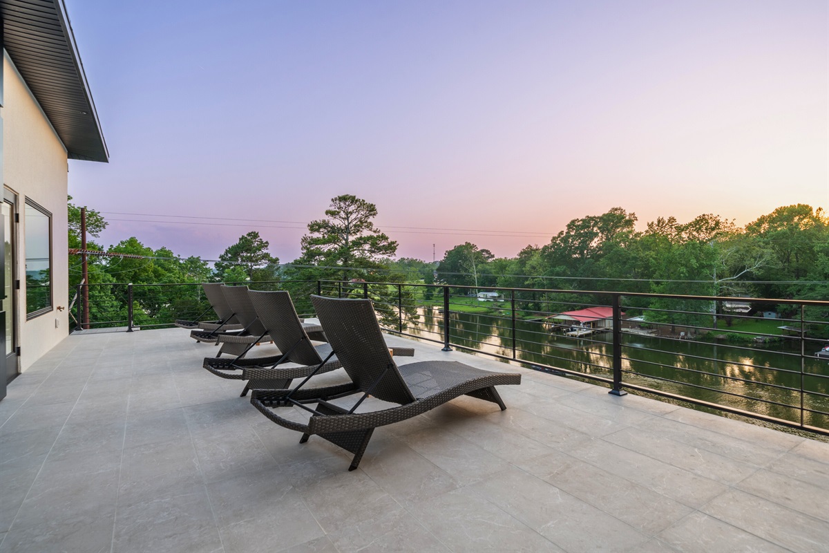Grab a seat and enjoy the serene lake views from the comfort of your own private deck, where nature&rsquo;s beauty is just a glance away.