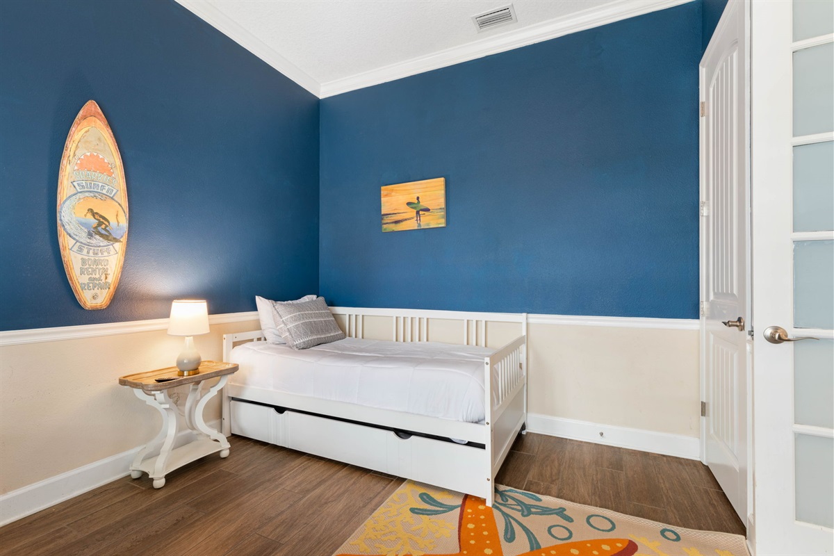 Tucked into its own cozy corner, this surf-inspired sleeping nook is perfect for midday recharges, late-night stories, and that happy feeling of having just enough space for everyone to settle in and make themselves at home.